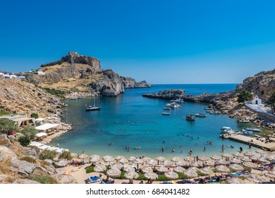 Summer Family Beach. St Paul's Bay In Lindos, Rhodes Greece