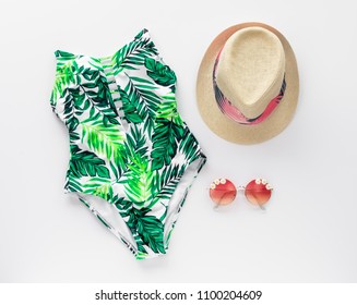 Summer Flat Lay Template With Palm Print One Piece Swim Suit, Sun Hat, Retro Sunglasses And Blank Space