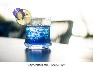 Summer Fresh Drink Butterfly Pea Drink And Slice Of Lime In Sunset Time