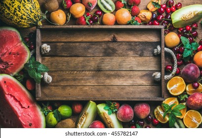 Summer Fresh Fruit Variety With Rustic Wooden Tray In Center, Top View, Copy Space, Horizontal Composition