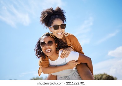 Summer, Friends And Freedom With Women And Piggy Back Against The Blue Sky For Hug, Lifestyle And Happy On Puerto Rico Holiday. Youth, Crazy And Friend With Girl On Vacation With Glasses And A Smile