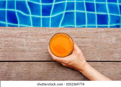 Summer Fruit Drink. Woman Relaxing At The Swimming Pool In Her Vacation, Top View