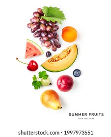 Summer fruits creative layout. Grape, melon, watermelon, apricot, red plum, cherry, pear, blueberry and gooseberry isolated on white background. Top view, flat lay. Design element - Shutterstock ID 1997973551
