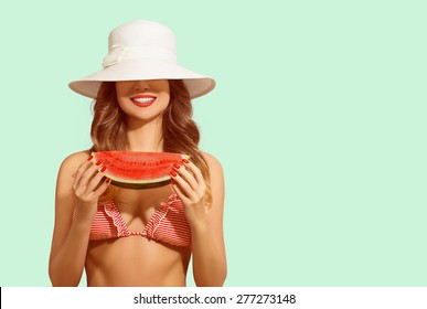 Summer Fun, Happy Woman Covers Face With Hat, Holding Water Melon And Smiling. Concept Of Vacation, Healthy Eating, Diet. 