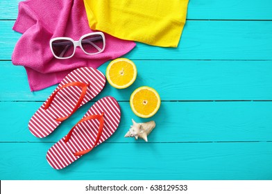 Summer Fun Time And Accessories On Blue Wooden Background. Mock Up And Picturesque