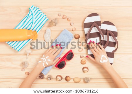 Summer fun time and accessories on wooden background. Summer concept.