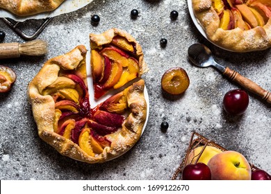 Summer Galette With Berries, Raspberry, Blueberry, Blackberry, Apple And Crusty Sugar Vegetarian Dough. Vegan Food. Healthy Food. Peach Pie. Tart. Summer Food, Summer Pie On Parchment Paper