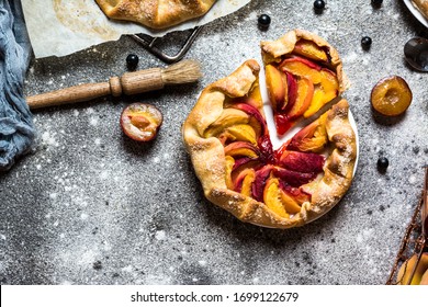 Summer Galette With Berries, Raspberry, Blueberry, Blackberry, Apple And Crusty Sugar Vegetarian Dough. Vegan Food. Healthy Food. Peach Pie. Tart. Summer Food, Summer Pie On Parchment Paper