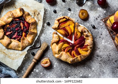 Summer Galette With Berries, Raspberry, Blueberry, Blackberry, Apple And Crusty Sugar Vegetarian Dough. Vegan Food. Healthy Food. Peach Pie. Tart. Summer Food, Summer Pie On Parchment Paper