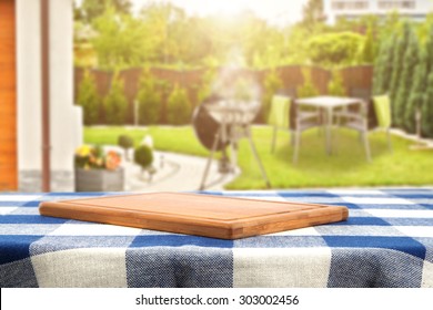 Summer Garden Desk Of Wood And Tablecloth 