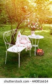 Summer Garden With Tea Party Setting. Outdoor Party Decorations