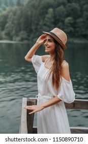 Summer Girl Portrait. Asian Woman Smiling Happy On Sunny Summer Or Spring Day Outside In Park By Lake.