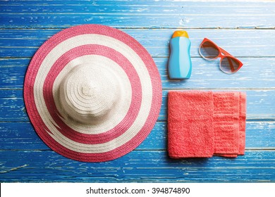 Summer holiday background, Beach accessories on blue distressed wood table, Vacation and travel items - Powered by Shutterstock