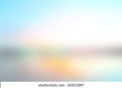 Summer holiday concept: concept: Abstract blur beach with yellow and blue sky sunrise background - Shutterstock ID 243513097