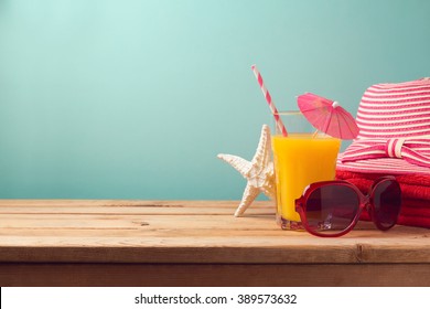 Summer Holiday Vacation Concept With Orange Juice And Beach Items