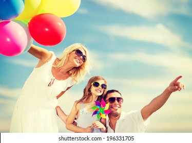 Summer Holidays, Celebration, Children And People Concept - Family With Colorful Balloons