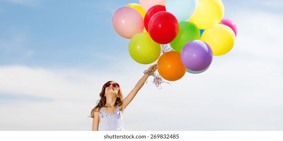 Summer Holidays, Celebration, Family, Children And People Concept - Happy Girl With Colorful Balloons