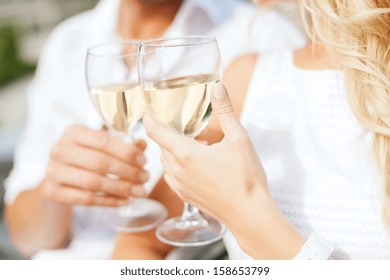 Summer Holidays And Dating Concept - Couple Drinking Wine In Cafe In The City