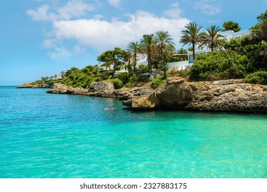 Summer holidays in Mallorca, the beach in the village of Cala d'or