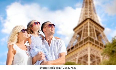 Summer Holidays, Travel, Tourism And People Concept - Happy Family In Paris Over Eiffel Tower Background