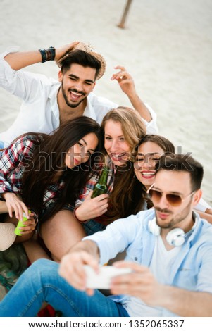 Similar – Group of young people having fun in summer party