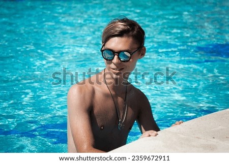 Similar – Close up of young man with sunglasses holding surfboard