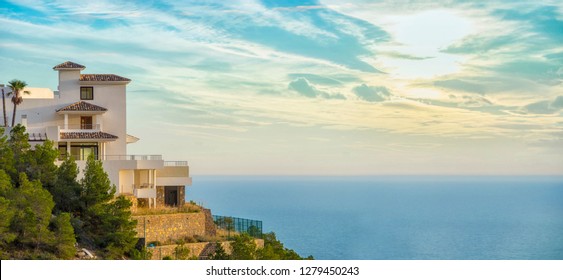 Summer house on the hilly sea coast.  - Shutterstock ID 1279450243