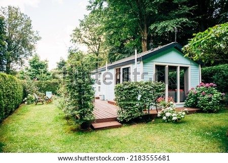 Summer house, vacation cottage on the edge of the forest