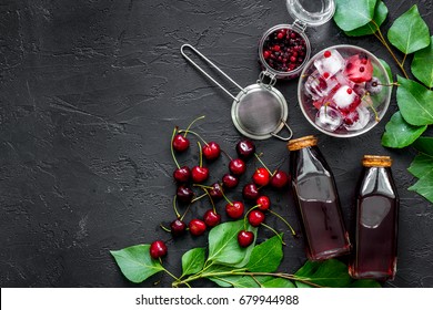Summer Ice Berry Juice With Cherry And Cranberry On Black Table Top View Copyspace