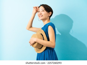 Summer image of a young woman in a dress - Powered by Shutterstock