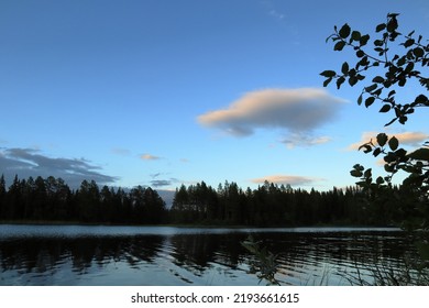 Summer Lake And Cloudy Sky One Evening. Reflection In The Water. Krokom, Jämtland, Sweden, Europe.