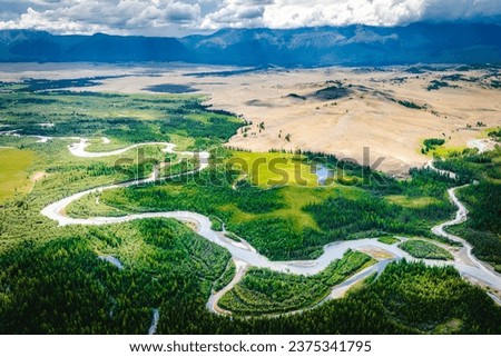 Summer landscape in the Altai mountains. Kurai steppe. Top view of the Chuya River valley. Kosh-Agachsky district of the Altai Republic, South of Western Siberia
