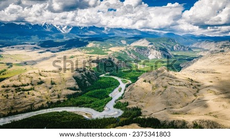 Summer landscape in the Altai mountains. Kurai steppe. Top view of the Chuya River valley. Kosh-Agachsky district of the Altai Republic, South of Western Siberia