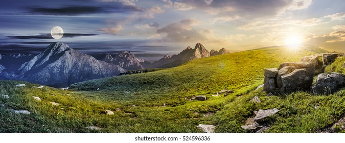 Summer landscape concept of Day and Night meet in High Tatra Mountains on a meadow with huge stones among the grass on top of the hillside near the peaks - Shutterstock ID 524596336