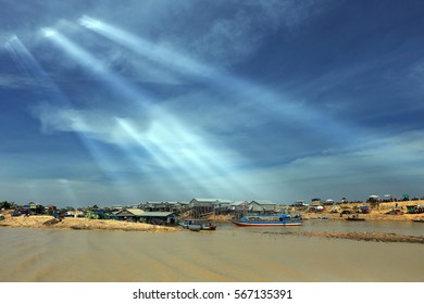 Summer Landscape Life On The Water In Cambodia, The Boats On The River, Houses Along The Coast On A Sunny Day