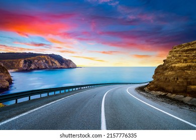 summer landscape on the highway. highway landscape at colorful sunset. Road view on the beach in summer time. colorful seascape with beautiful road. European highways. colorful nature landscape. - Shutterstock ID 2157776335