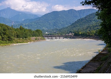 Summer landscape of the river dam at the mountain river rapids of Dujiangyan Irrigation System, Dujiangyan, Sichuan, China 