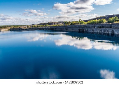 Summer Landscape Scene Featuring The Marmoraton Mine Blue Hole Lake In Marmora Ontario Canada, Paleozoic Sherman Fall Thin Medium Bedded Of Crystal Line Limestone With Interbedded Grey-green Shale 