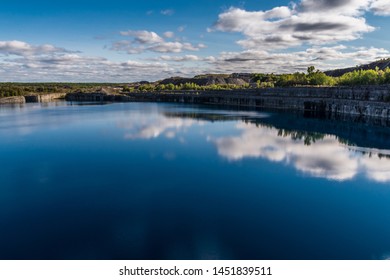 Summer Landscape Scene Featuring The Marmoraton Mine Blue Hole Lake In Marmora Ontario Canada, Paleozoic Sherman Fall Thin Medium Bedded Of Crystal Line Limestone With Interbedded Grey-green Shale 