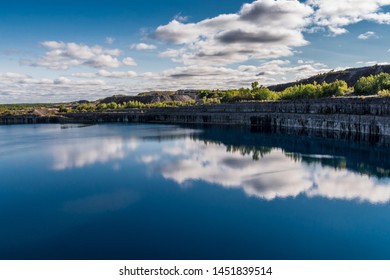 Summer Landscape Scene Featuring The Marmoraton Mine Blue Hole Lake In Marmora Ontario Canada, Paleozoic Sherman Fall Thin Medium Bedded Of Crystal Line Limestone With Interbedded Grey-green Shale 