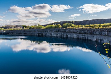 Summer Landscape Scene Featuring The Marmoraton Mine Blue Hole Lake In Marmora Ontario Canada, Paleozoic Sherman Fall Thin Medium Bedded Of Crystal Line Limestone With Interbedded Grey-green Shale 