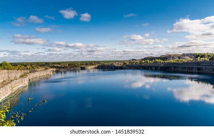 Summer Landscape Scene Featuring The Marmoraton Mine Blue Hole Lake In Marmora Ontario Canada, Paleozoic Sherman Fall Thin Medium Bedded Of Crystal Line Limestone With Interbedded Grey-green Shale 