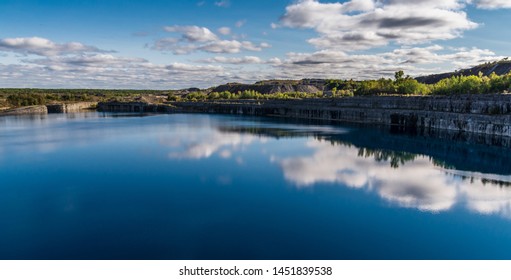 Summer Landscape Scene Featuring The Marmoraton Mine Blue Hole Lake In Marmora Ontario Canada, Paleozoic Sherman Fall Thin Medium Bedded Of Crystal Line Limestone With Interbedded Grey-green Shale 