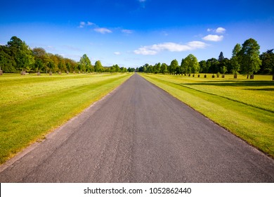 Summer Landscape With Straight One Lane Country Road In Southern England UK