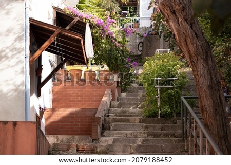 Summer landscape, view of stairs and steps to streets in Princes' Islands city of Istanbul. Public places on the streets of the city.