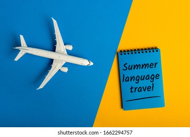 Summer Language Travel - Message On Color Background With Airplane Toy. Learning English Language And Studying Abroad