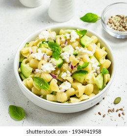 Summer low calorie feta cheese cucumber pasta salad. Space for text.