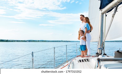 Summer Moments. Family Standing On Yacht Deck Sailing Across The Sea Outside. Free Space For Text, Panorama