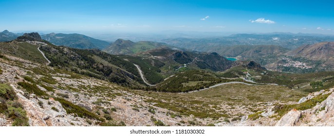 Summer Mountain Landscape With Alpine Road And Lake (Sierra Nevada National Park, Near Granada, Spain).