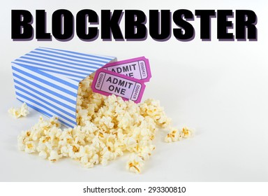 Summer Movie Theme With A Blue And White Striped Bucket Full Of Popcorn And Two Purple Movie Tickets. Popcorn Is Scattered About White Background. Removable Summer Blockbuster Movie Text